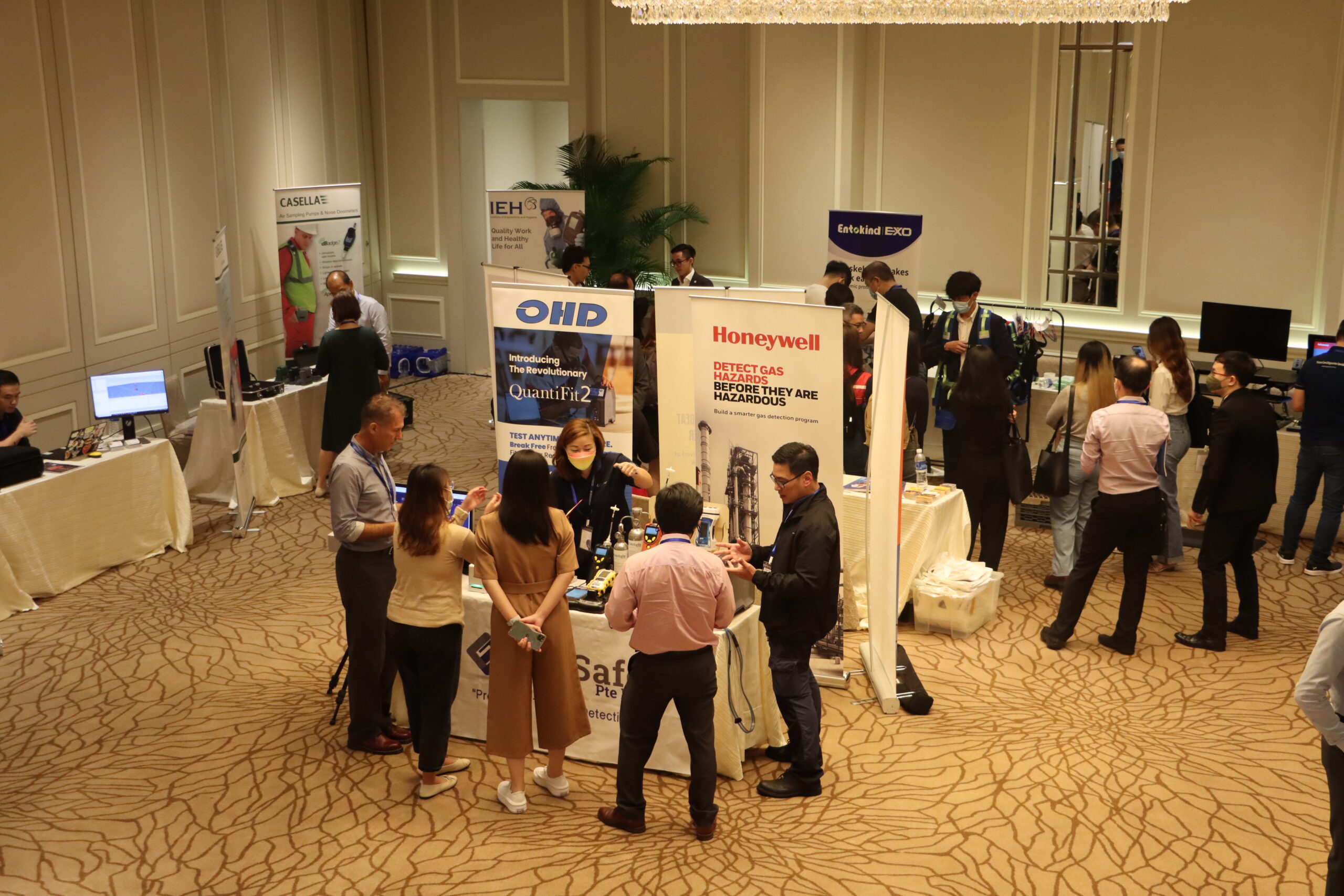 Delegate discussion during a past EH Conference exhibition